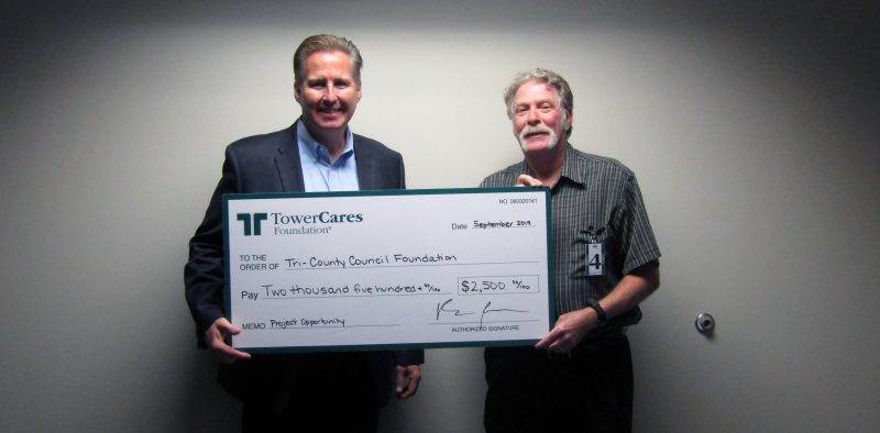 Rick Stafford, TowerCares Foundation President, presenting check to Joe Giordano, Founder Project Opportunity<sup><p id=