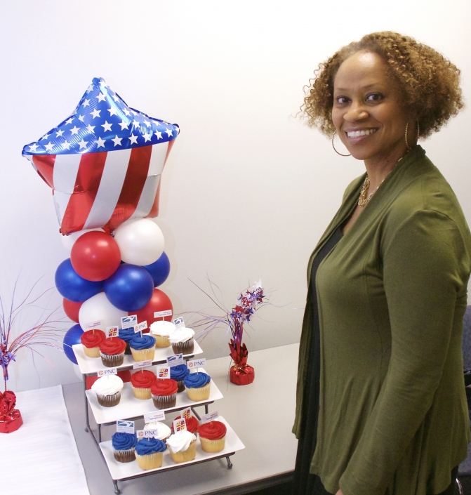 Angela Sweetwine Phillips with her donation to the Graduation Ceremony