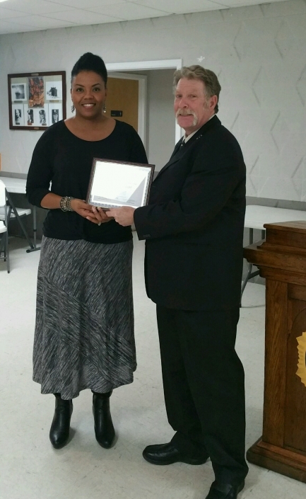 Joe Giordano presenting Certificate of Completion to Catena Jeffcoat