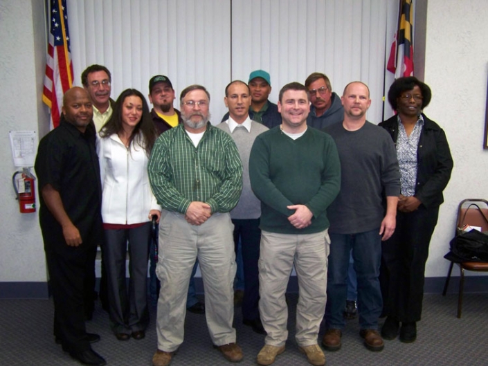 Left to Right: First Row: Richard Newcomb & Ernie Adkins. Second Row: James Gardner, Naomi Donohue, Daniel Padilla, & Steve Hall. Third Row: Brandon Donohue, William Engle, James Monroe, Frank Disharoon, & Barbara Anderson. Not Pictured: James Forde.