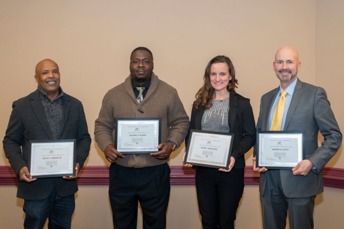 Graduating Class Photo: Left to Right: Kevin C. Parker, Sr.; Michael A. Eaddy, Jaime I. Rosevear, Robert M. Dixon