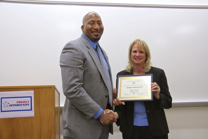 Brenda Dilts, Course Facilitator, presenting Graduation Certificate to Robert Worthington