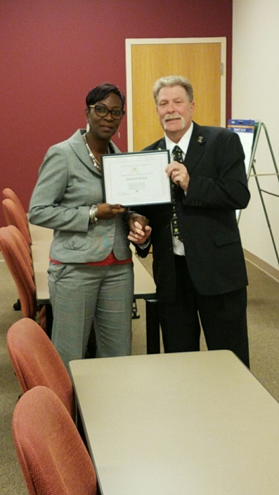 Joe Giordano, Founder Project Opportunity<sup>SM</sup>, presenting Graduation Completion Certificate to Pastina Tingle