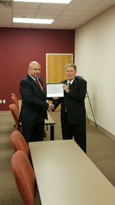 Joe Giordano, Founder Project Opportunity<sup>SM</sup>, presenting Graduation Completion Certificate to Robert Culver