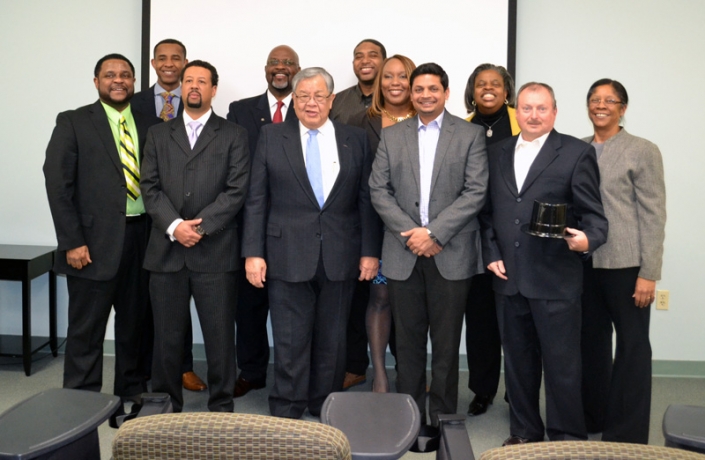 1st Row Left to Right: Michael Camphor, Fred Barnes, Secretary Chow, Vishal Amin, & Sonny Merryman. 2nd Row Left to Right: Dennard Covington, Jomoya Mobutu, Derich Cummings, Sharon Cummings, Nadine Batchelor, & Cicky Estep.