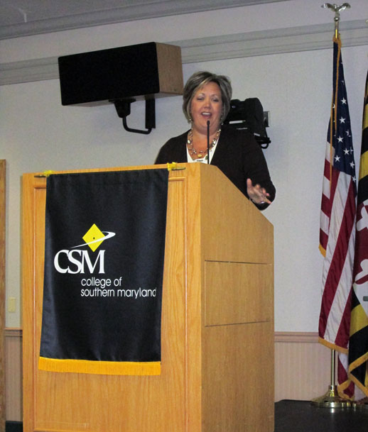 Kelly Robertson Slagle, Executive Director of the Southern Maryland SBDTC, addresses the graduating class