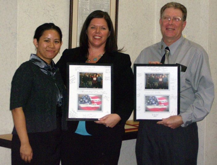 Gail Schnell presenting Class of 2011 Class Gift to instructors Kristen Bacon and Joe Giordano.