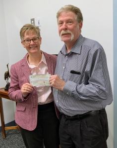 Carlene Cassidy, Chief Executive Officer, Philip E. & Carole R. Ratcliffe Foundation presenting check for first year of grant to Joe Giordano, Founder Project Opportunity