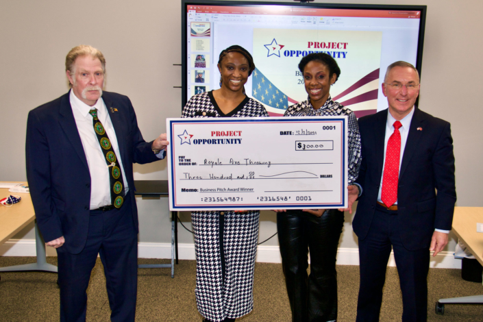 Ronecia Simmons and Tamarra Farrow Steward Business Pitch Award Check Presentation