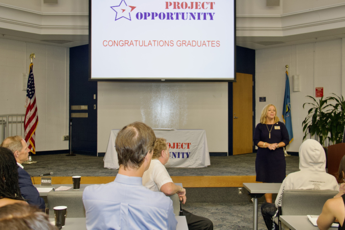 Karen Holt, Director Harford County Economic Development, welcoming graduates and guests