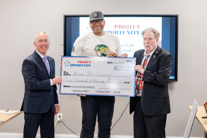 James Jones, Armis Dei Apparel, Business Pitch Award Check Presentation