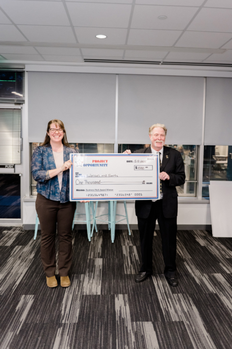 Kaitlin Worzalla, Worzel & Hearts, First Place Check Award Presentation of $1000.00 in Graduation Business Pitch Competition