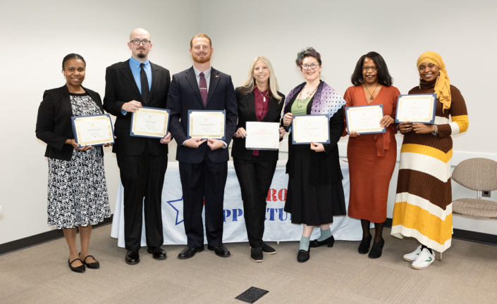 Graduation Class Photo Left to Right: Hajja Sahid-Sanh, Jared Snyder, Austin Ryan Keelty, Kelly Foster Course Facilitator, Cassaundra Parrish, Nikki Welch, Asuma Jolloh