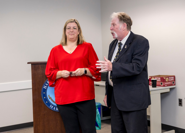 Presenting Project Opportunity Coin to Bonnie Barresi, Business Pitch Judge